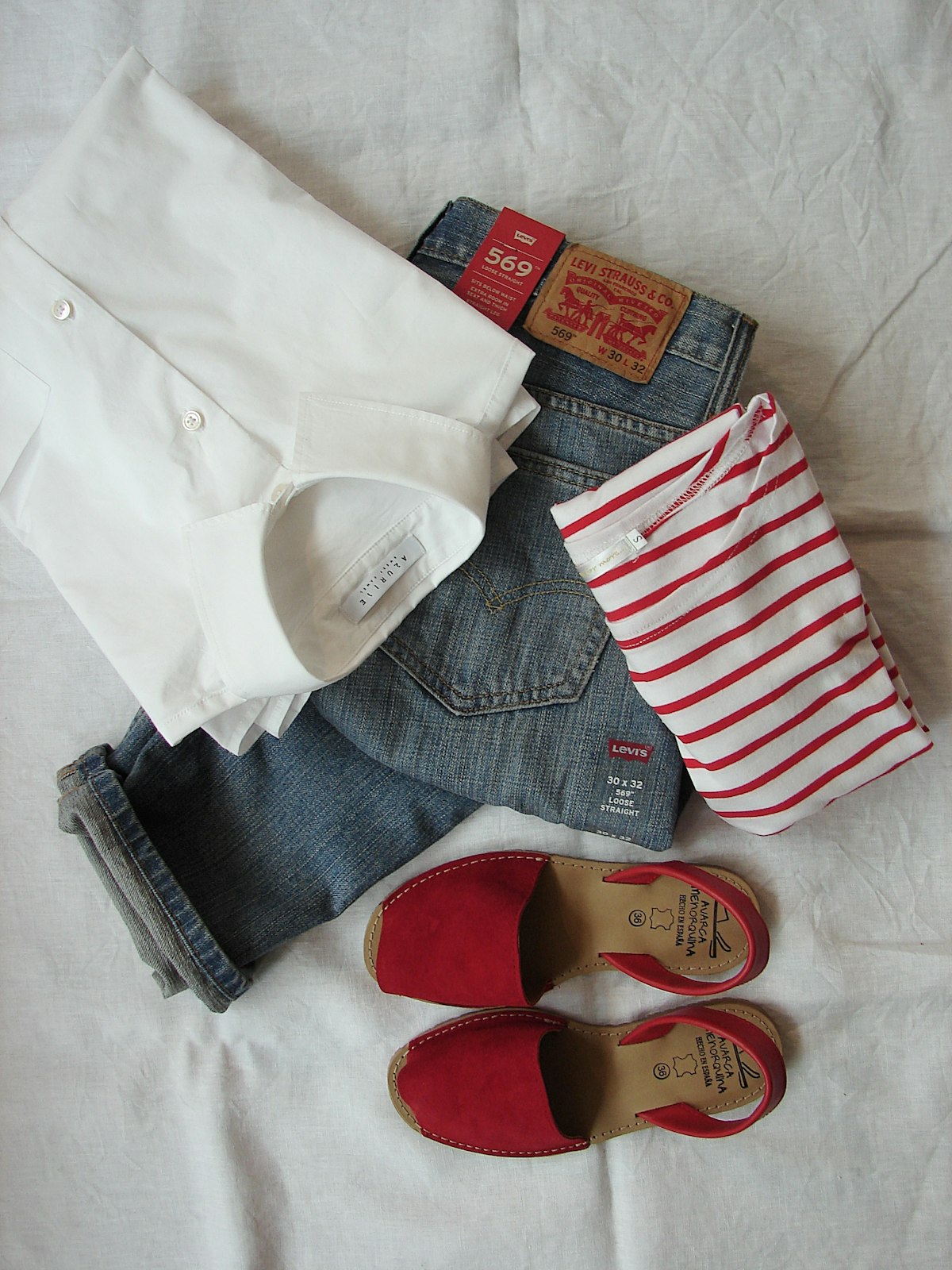 Folded neutral knitwear and tailored basics